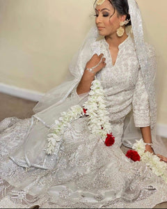 White embroidered gown